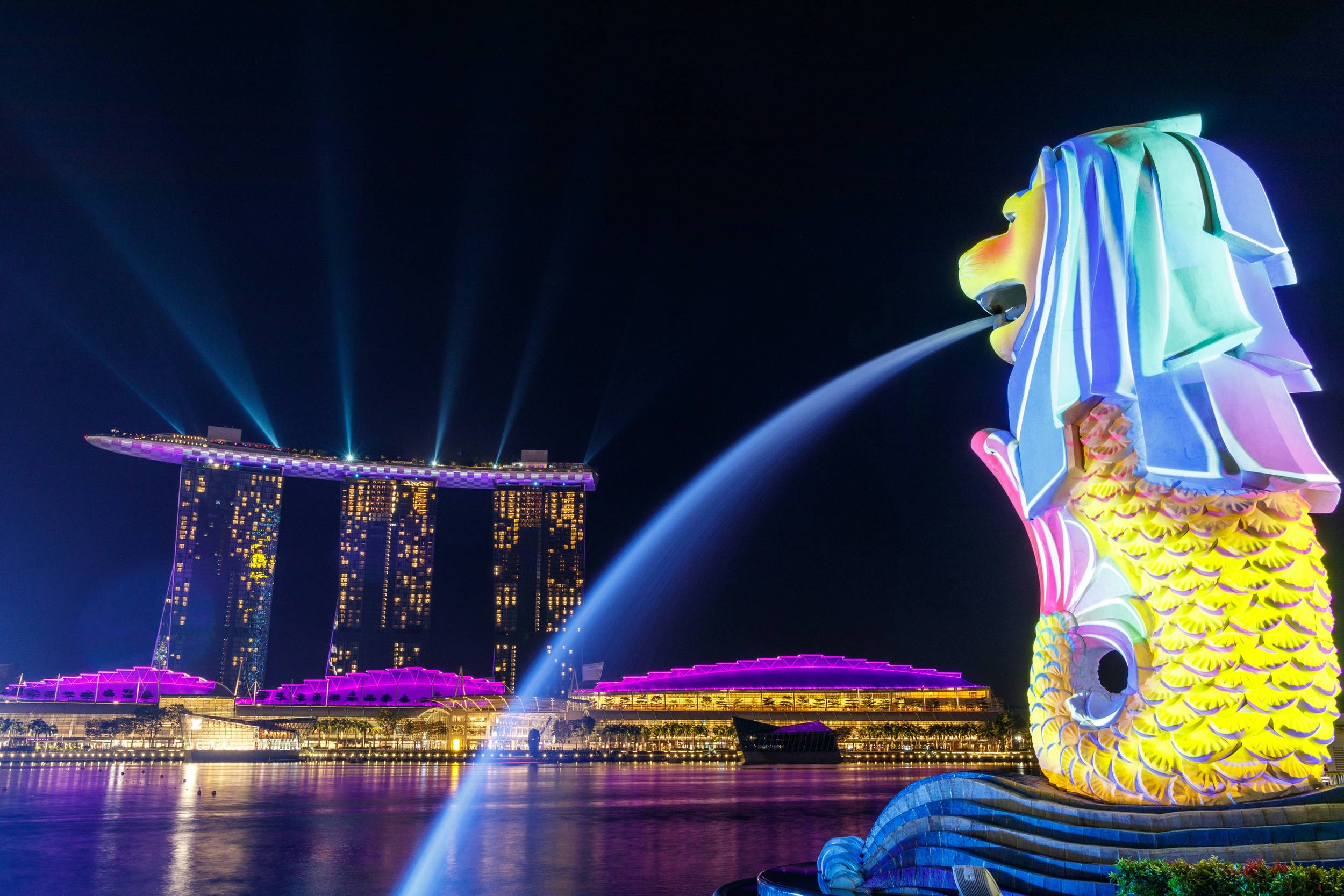 The Merlion Statue Against the Backdrop of Singapore’s Skyline