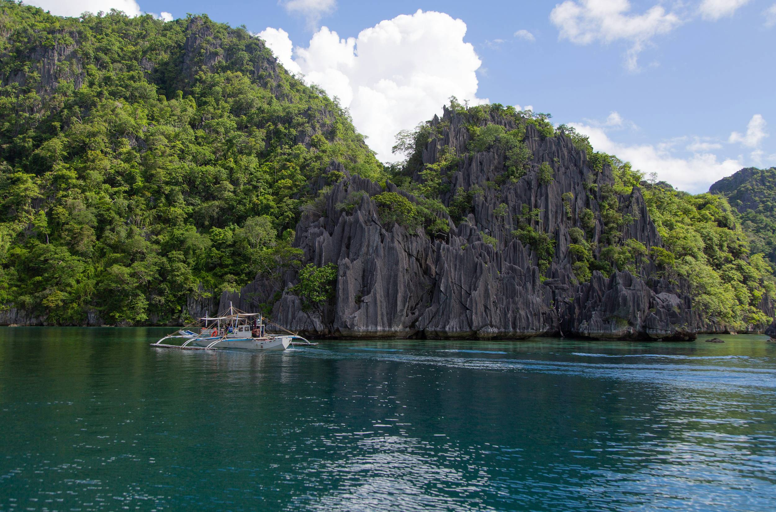Crystal Clear Waters and Dramatic Limestone Cliffs in Coron, Philippines